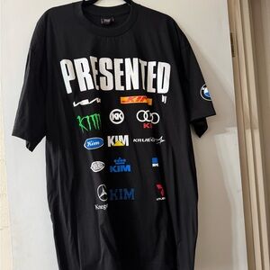 Kim Krueger Presented By Logo Black Graphic T-Shirt